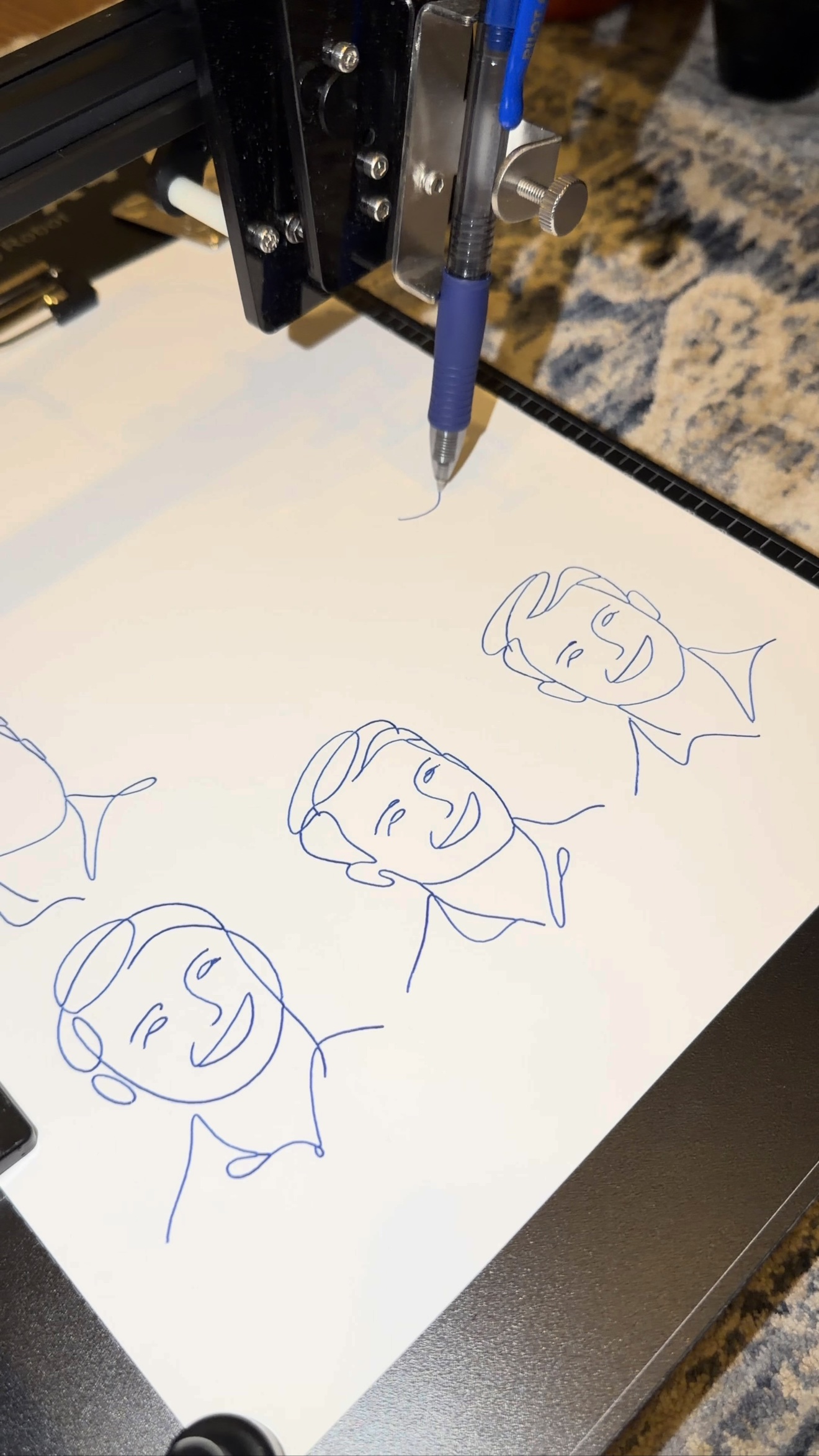 Single-line face portraits mid-plot