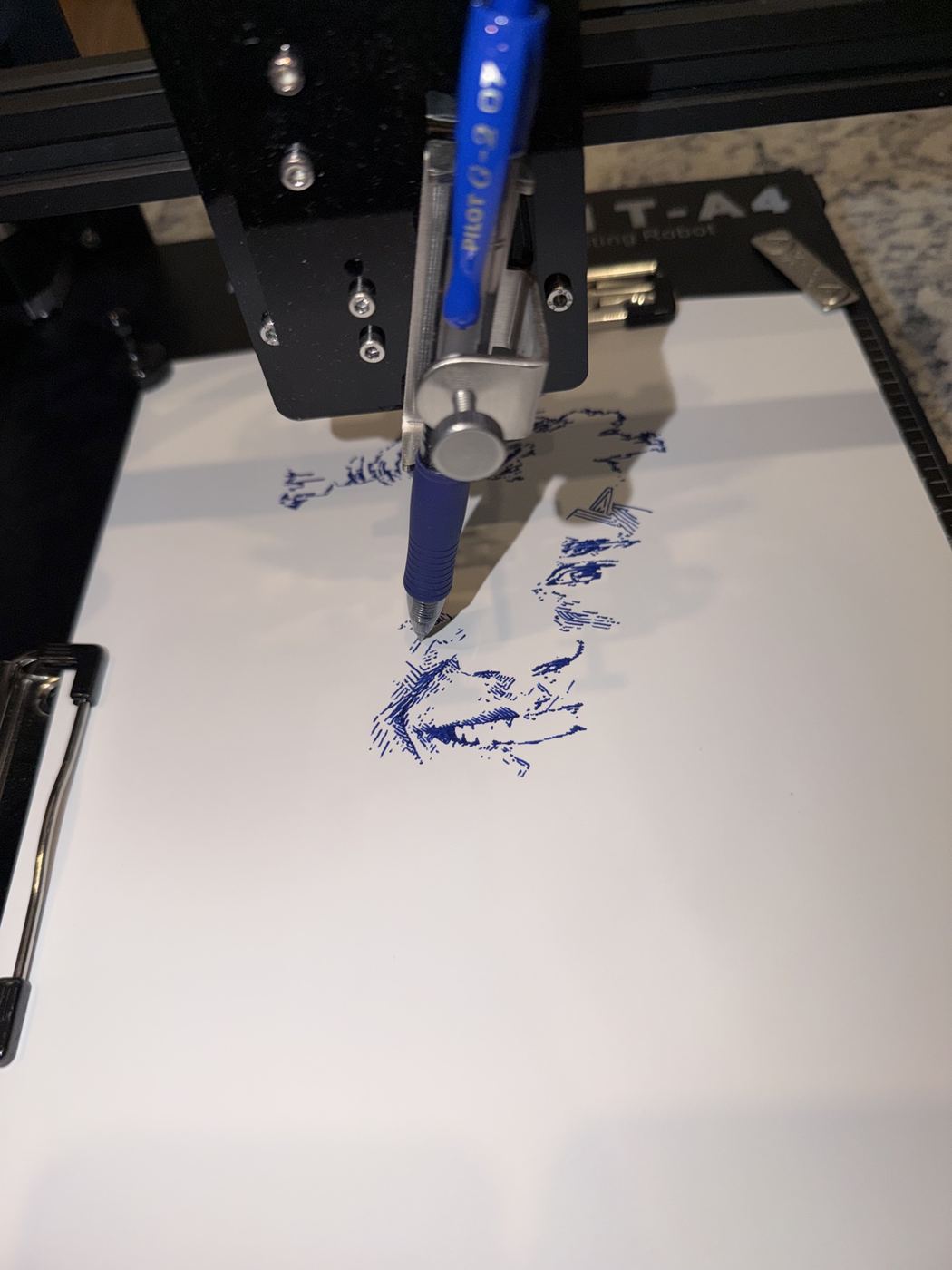 Pen plotter mid-draw