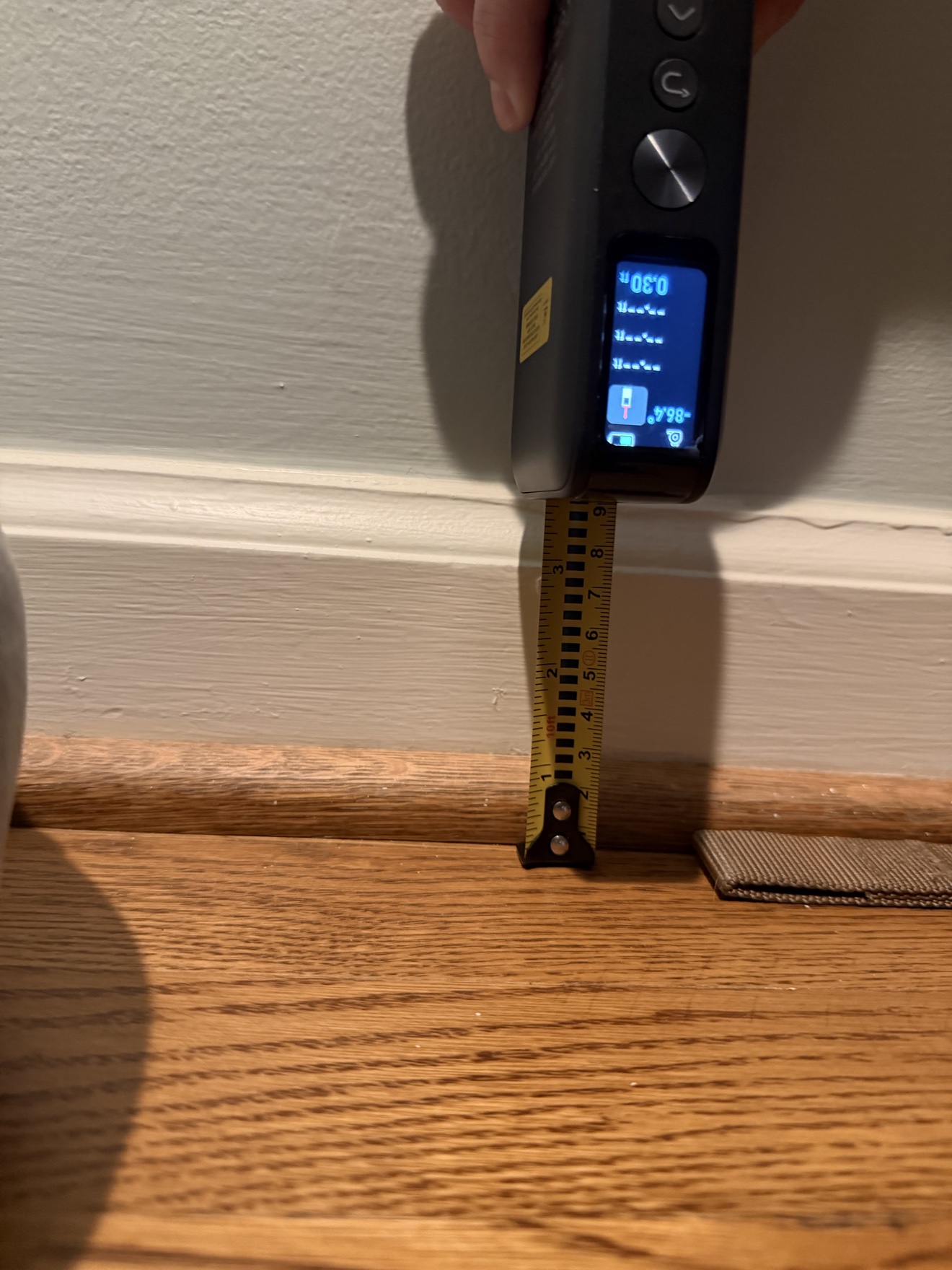 Measuring the baseboards